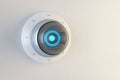 Close up of modern round white cctv camera on concrete wall background. Safety system and security concept. 3D Rendering