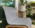 Close up modern textile chair at house terrace with garden Royalty Free Stock Photo