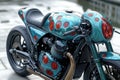 Custom Teal Motorcycle with Red Dot Design, Detailed Close-up Royalty Free Stock Photo