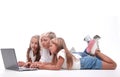 Close up. mom and daughters watching a movie on a laptop Royalty Free Stock Photo