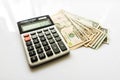 Close-up Money and Calculator, American Dollar Banknotes Royalty Free Stock Photo