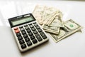 Close-up Money and Calculator, American Dollar Banknotes Royalty Free Stock Photo