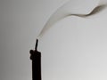 Smoke from Extinguished Candle with Bright Background Royalty Free Stock Photo