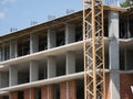 Close-up of a monolithic-frame building under construction with brick walls Royalty Free Stock Photo