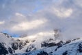 The close-up of Mont Blanc du Tacul in the clouds in Europe, in France, in the Alps, towards Chamonix, in summer