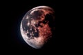 close-up of the moon, with its surface visible in detail during a solar eclipse