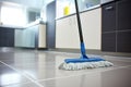 close-up of a mop cleaning a bathroom floor Royalty Free Stock Photo
