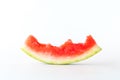 Close up of a mostly eaten watermelon slice isolated against a white background. Royalty Free Stock Photo