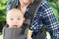 Close Up Of Mother With Baby Daughter In Carrier Royalty Free Stock Photo