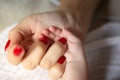 Close up of mother and child hands, love and security