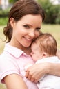 Close Up Of Mother Cuddling Newborn Baby Boy Outdo Royalty Free Stock Photo