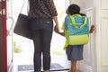 Close Up Of Mother And Daughter Leaving For School Royalty Free Stock Photo