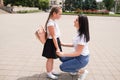 Close Up Of Mother And Daughter Leaving For School Royalty Free Stock Photo