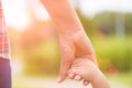 Close up mother holding a child`s hand. Royalty Free Stock Photo