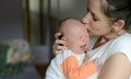 Close up of mother holding her cute baby daughter Royalty Free Stock Photo