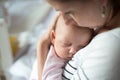 Close up of mother holding her cute baby daughter Royalty Free Stock Photo
