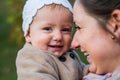 Close up of mother holding her cute baby daughter Royalty Free Stock Photo