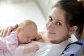 Close up of mother holding her cute baby daughter Royalty Free Stock Photo