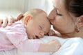 Close up of mother holding her cute baby daughter Royalty Free Stock Photo