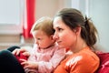 Close up of mother holding her cute baby daughter Royalty Free Stock Photo