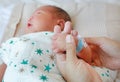 Close up mother`s holding baby hand. Concept of love and family Royalty Free Stock Photo