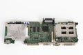 Close up of motherboard old laptop with parallel, serial , VGA, PS2 port and cooler of microprocessor on white background