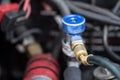Close up motor car machine gas injector installing in gasoline e