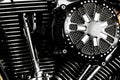 Close-up motorcycle engine, shiny chrome engine. Royalty Free Stock Photo