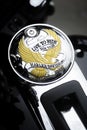 Close up of a motorcycle fuel tank cap with the Harley Davidson Royalty Free Stock Photo