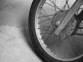 CLOSE-UP OF MOTORCYCLE SPOKES AND WHEEL