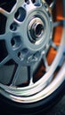 A close up of a motorcycle wheel, AI Royalty Free Stock Photo