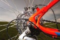 Close-up of mountain bike sprockets and chain. Bicycle parts, fragment of rear wheel brake disc, frame Royalty Free Stock Photo