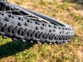 Close up of mountain bike wheel profile with dirt and natrual background Royalty Free Stock Photo