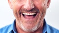 Close Up Of Mouth Of Laughing Mature Man In Studio Royalty Free Stock Photo