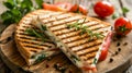 Close up of mouthwatering melted cheese sandwich served on a charming wooden board