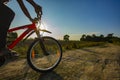 Close up of a moving bicycle from village mud road on a evening day