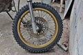 Close-up of muddy rear wheel and engine Royalty Free Stock Photo