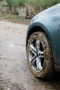 Close-up of a muddy tire on a car