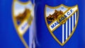 Close-up of mugs with the shield of the Spanish soccer team Malaga CF