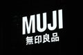 Close up MUJI brand logo in black background Royalty Free Stock Photo