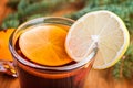 Close up of mulled wine with spices and orange Royalty Free Stock Photo
