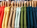 Close up Multicolor Shirts are hanging on Clothes Hanger