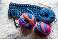 Close-up of multicolored and blue natural wool yarn balls. Royalty Free Stock Photo