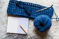 Close-up of multicolored and blue natural wool yarn balls. Royalty Free Stock Photo