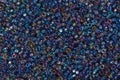 Close up of multicolored blue seed beads. Royalty Free Stock Photo