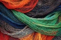 close-up of multicolored fishing nets stacked on a boat deck