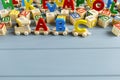 Close up Multicolored wooden letters with ABC on gray background. Set of toys for studying alphabet. Education, back to school Royalty Free Stock Photo