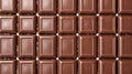 Close-up of multiple milk chocolate squares arranged in rows Royalty Free Stock Photo