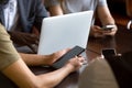 Close up of multiracial people using gadgets during meeting out Royalty Free Stock Photo