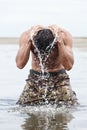 Close up Muscled Army Bathing at the Sea